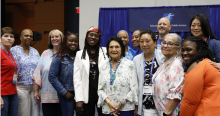 AFT Massachusetts President Tang, Boston Teachers Union President Berg, and BTU delegates pose with AFT’s 2026 Lifetime Achievement Awardee Dolores Huerta 